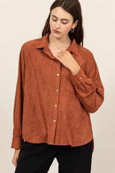 THIS BUTTON-UP LONG SLEEVE SHIRT OFFERS A PERFECT BLEND OF CASUAL COMFORT AND EFFORTLESS STYLE. DESIGNED WITH A CLASSIC COLLAR AND FRONT POCKET, THIS SHIRT ADDS A TOUCH OF SOPHISTICATION TO ANY OUTFIT. THE BUTTON-UP FRONT ALLOWS FOR EASY WEAR AND VERSATILITY, MAKING IT IDEAL FOR LAYERING OR WEARING ON ITS OWN. THE SOFT FABRIC PROVIDES ALL-DAY COMFORT, WHILE THE RELAXED FIT ENSURES A FLATTERING SILHOUETTE. PERFECT FOR BOTH WORK AND LEISURE, THIS SHIRT IS A WARDROBE ESSENTIAL. MODEL IS 5' 7" TALL, Solid Shirt With Collared Neckline For Fall, Solid Collared Shirt For Fall, Versatile Collared Tops For Fall, Trendy Collared Tops For Fall, Trendy Fall Tops With Collared Neckline, Versatile Shirt With Shirttail Hem For Fall, Versatile Fall Shirt With Shirttail Hem, Versatile Solid Color Fall Shirt, Brown Spread Collar Tops For Spring