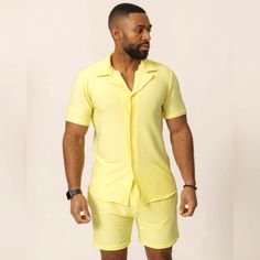 Introducing The Lemon Shirt And Shorts, A Perfect Blend Of Style And Comfort For The Modern Gentleman. This Vibrant Outfit Features A Yellow Shirt And Shorts, Complemented By A Sleek Black Watch. Ideal For The Discerning Man With A Taste For Fashion. Casual Fitted Collared Set, Yellow V-neck Summer Set, Yellow Short Sleeve Sets For Vacation, Yellow Short Sleeve Vacation Sets, Fitted Shirt For Summer Loungewear, Fitted Summer Shirt For Loungewear, Summer V-neck Loungewear Shirt, Lemon Shirt, Vibrant Outfits