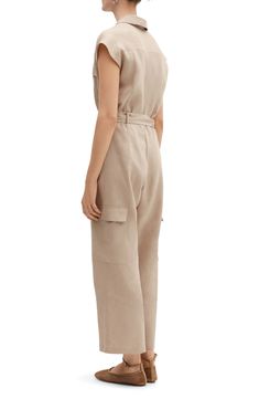 Cargo style is coming in hot right now, and this linen jumpsuit is a one-and-done way to wear the trend. V-neck with spread collar Sleeveless Chest flap-patch pockets; cargo flap-patch pockets Removable sash Cotton lining 100% linen Dry clean or machine wash, line dry Imported Spring Linen Jumpsuits And Rompers For Work, Linen Jumpsuits And Rompers With Pockets, Linen Jumpsuits And Rompers With Pockets For Work, Chic Linen Jumpsuits And Rompers With Pockets, Fitted Linen Jumpsuits And Rompers With Pockets, Utility Cotton Cargo Jumpsuits And Rompers, Utility Style Cotton Jumpsuits And Rompers With Cargo Details, Beige Linen Wide-leg Cargo Pants, Summer Utility Button-up Jumpsuits And Rompers