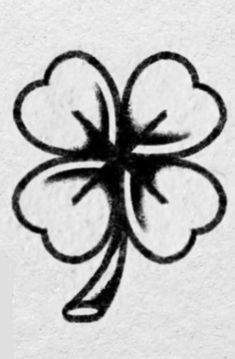 a black and white drawing of a four leaf clover