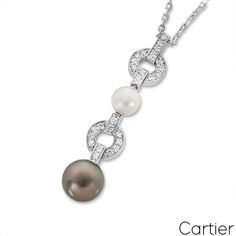 For Sale on 1stDibs - A beautiful 18k white gold pearl and diamond necklace by Cartier from the Himalia collection. The pendant alternates between a diamond set circular motif Elegant Cartier Brilliant Cut Necklace, Elegant Cartier Diamond Necklace With Brilliant Cut, Elegant Cartier Brilliant Cut Diamond Necklace, Cartier White Gold Diamond Necklace, Cartier Elegant Diamond Wedding Necklace, Elegant Cartier Diamond Necklace For Wedding, Cartier White Gold Necklace For Weddings, Elegant Cartier White Gold Necklace, Elegant White Gold Cartier Necklace