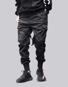 Black sleeveless jacket | Techwear Functional Black Cargo Pants, Functional Black Cargo Style Pants, Functional Baggy Pants For Streetwear, Techwear Parachute Pants With Functional Pockets For Streetwear, Techwear Pants With Side Pockets, Sporty Streetwear Joggers With Hip Pockets, Baggy Techwear Pants With Functional Pockets, Sporty Joggers With Functional Pockets For Streetwear, Winter Techwear Parachute Pants