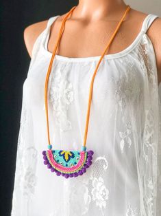 Multicolor Crochet Bohemian Jewelry, Multicolor Folk Style Festival Jewelry, Bohemian Macrame Beaded Necklaces For Festivals, Bohemian Multicolor Embroidered Beaded Necklaces, Handmade Bohemian Purple Beaded Necklaces, Bohemian Multicolor Macrame Necklaces, Handmade Bohemian Multicolor Embroidery Jewelry, Handmade Purple Bohemian Beaded Necklaces, Bohemian Handmade Purple Beaded Necklaces