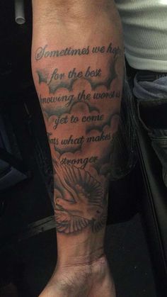 a man's arm with a quote on it that says sometimes we hope for the best