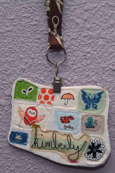 a key chain hanging from the side of a wall