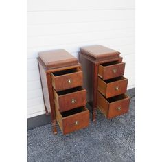 two wooden drawers sitting next to each other