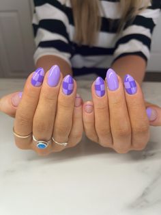 Simple Spring Nail Ideas Almond Shape, Fun Nail Designs Purple, Nail Inspo Summer Purple, Pink And Purple Checkered Nails, Fun Nails Almond Shape, Fun Almond Shaped Nails, Fun Nails Purple, Purple Gel Nails Designs, Funky Oval Nails