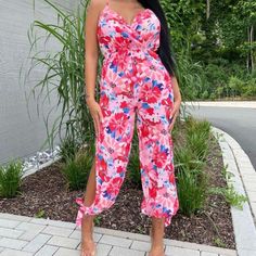 Nwt Imported From Europe Jumpsuits Are Without A Doubt, A Statement Style. The Head-To-Toe, All-In-One Garment Creates A Striking Look. Be A Picture Of Perfection Wearing This Floral Jumpsuit Featuring Split Side. Add Strappy Heels And Statement Earrings For A Pretty Look! Strappy Jumpsuit Floral Print Split Side Regular Fit Model Is 5ft 7" & Wears Us Size 4 Uk Size 8 Eu Size 38 Aus Size 8 100% Polyester Machine Washable Summer Pink Jumpsuits And Rompers For Loungewear, Pink Jumpsuits And Rompers For Spring Vacation, Pink Summer Vacation Jumpsuits And Rompers, Summer Pink Jumpsuits And Rompers For Beach, Chic Pink Beach Jumpsuits And Rompers, Pink Summer Jumpsuits And Rompers For The Beach, Chic Pink Jumpsuits And Rompers For Beach, Pink Jumpsuits And Rompers For Spring Day Out, Casual Pink One-piece Jumpsuits And Rompers