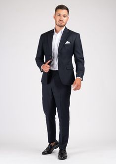 The Astor Dark Navy Twill Suit is an elegant and timeless professional wardrobe staple. Versatile for a variety of occasions, get ready to look your best in this custom made suit, wherever you wear it. Elegant Semi-formal Pantsuit With Pressed Crease, Tailored Elegant Formal Pantsuit, Tailored Elegant Pantsuit For Formal Occasions, Elegant Tailored Pantsuit For Formal Occasions, Luxury Single Breasted Workwear Set, Elegant Pantsuit With Pressed Crease, Luxury Notch Lapel Wedding Pantsuit, Luxury Notch Lapel Pantsuit For Wedding, Wedding Three-piece Suit With Welt Pockets