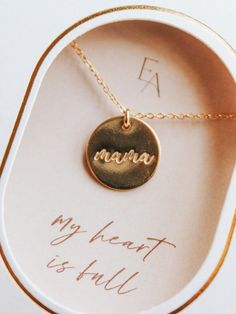 Ever Aster Mama Necklace The perfect gift for a new mom. Product Details Necklace comes in either gold-filled or sterling silver Chain can be adjusted to 16 or 18 inches Charm measures 1/2 inches in diameter Hand stamped Ever Aster inspires meaningful connections by spreading hope and simplicity through its jewelry. These pieces are the perfect gift to convey a heartfelt message to your loved one that shines with thoughtfulness, kindness, and gratitude. We hope you find as much joy in wearing yo Jewelry For Moms, Mama Necklace, Gift Inspo, Detailed Necklace, Meaningful Connections, Mom Jewelry, New Mom, Sterling Silver Chain, New Moms