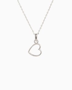 The Heart Charm is handcrafted in sterling silver and is a sweet piece to add to your collection. Let this charm serve as a reminder of your love for the islands or for someone special in your life. Pair with your favorite hook bracelet or dainty chain, sold separately. Metal: Sterling silver Dimensions: 15mm x 10mm Style #: C202 Minimalist Nickel-free Heart Pendant Jewelry, Delicate Sterling Silver Charm Necklaces, Delicate Sterling Silver Charm Necklace, Sterling Silver Charm Necklaces As Gift For Her, Sterling Silver White Gold Charm Necklaces, Delicate Open Heart Silver Jewelry, Silver Delicate Open Heart Necklace, Delicate Silver Open Heart Jewelry, Delicate Silver Open Heart Necklace