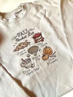 The cutest simple Fall Bucket List Embroidered design, perfect for fall lovers. Made on a Hanes Eco Smart or Gildan Crewneck. Message shop if interested in comfort colors. Fall Sweatshirt Ideas, Fall Lovers, Fall Bucket List, Embroidered Crewneck, Sweater Gift, Custom Gifts, Fall Sweatshirt, Cute Sweaters, Embroidered Design