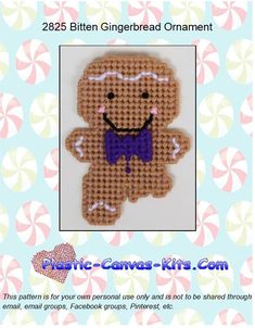 a cross stitch gingerbread ornament with a purple bow tie