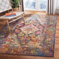 an area rug with a chair and window in the background