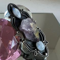 This Ring Is Amazing Sterling Silver 925 2 1/2 Inches Long An Inch In Width A Gothic Moon Ring With Amethyst And Fire Blue Moon Stones You’ll Never See A Ring Like This Ever! New Orleans Gothic, Silver Moon Ring, Moon Stones, Fire Blue, Moon Ring, Blue Moonstone, Silver Moon, Moon Stone, Blue Moon