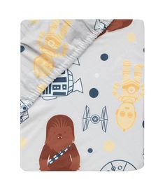 a blanket with star wars characters on it and a brown bear in the middle,