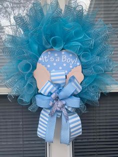 it's a boy wreath on the front door