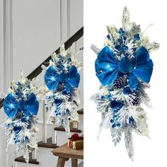 blue and white christmas decorations hanging from the banister