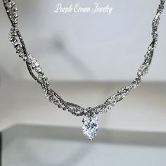 A necklace with a ribbon and heart motif zirconia pendant top♡

 This is a unique chain that consists of three types of chain: snake, ball, and rhinestone.

 Comes with a long adjuster so you can adjust the length.



 Color: Silver

 Chain length: approx. 40cm (+ 5cm adjuster)

 Pendant size: approx. 1.5cm x 1.1cm

 Material: Zinc alloy



 As this is an imported product, please refrain from purchasing if you are sensitive or looking for perfection. Elegant Crystal Heart Pendant Rhinestone Necklace, Elegant Crystal Rhinestone Heart Pendant Necklace, Elegant Rhinestone Crystal Necklace With Heart Pendant, Elegant Crystal Rhinestone Necklace For Valentine's Day, Elegant Snake Chain Necklace For Valentine's Day, Elegant Valentine's Day Snake Chain Necklace, Elegant Cubic Zirconia Rhinestone Necklace For Valentine's Day, Elegant Crystal Rhinestone Heart Necklace, Anniversary Crystal Rhinestone Necklace With Adjustable Chain