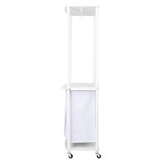 a white cart with a towel on it