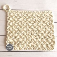 the crochet dishcloth is made with yarn