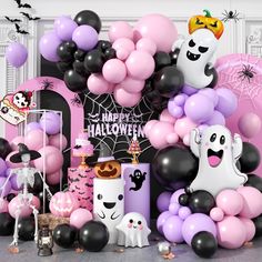 halloween themed party with balloons and decorations