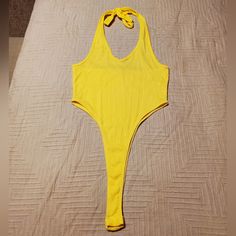 Brand New! Trendy Spring Bodysuit With Halter Neck, Casual Halter Neck Bodysuit For Party, Casual Halter Neck Bodysuit For Beach Season, Casual Summer Bodysuit With Halter Neck, Summer Casual Halter Neck Bodysuit, Stretch Halter Neck Bodysuit For Spring, Spring Stretch Halter Neck Bodysuit, Yellow Fitted V-neck Bodysuit, Summer Fitted Halter Neck Bodysuit