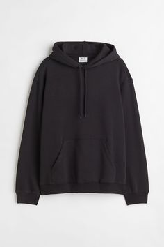 H&M Essentials. No. 3: The Hoodie. Relaxed-fit sweatshirt hoodie in cotton-blend fabric with soft  brushed inside. Jersey-lined drawstring hood  kangaroo pocket  and long sleeves. Wide ribbing at cuffs and hem. Sweat Noir, Sweatshirt Fabric, Sweat Hoodie, Sports Hoodies, Lady Grey, Workout Sweatshirt, Zipper Jacket, Workout Hoodie, Cotton Hoodie