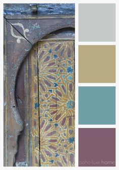 an old door with some paint on it and the color scheme is blue, brown, green