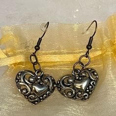 Swirly Heart Dangler Earrings. Stylish, Lightweight And Antique Looking. The Holidays Are Here! Great Little Something For The Open-Hearted. Nice Gift! Please Share If You’re Not Interested. Thanks. Metal Heart Pendant Earrings For Anniversary, Silver Heart Drop Earrings For Valentine's Day, Valentine's Day Silver Heart Drop Earrings, Nickel-free Open Heart Metal Earrings, Metal Heart Earrings With Heart Beads, Vintage Silver Metal Heart Earrings, Nickel-free Double Heart Silver Earrings, Nickel-free Silver Heart Earrings, Nickel-free Silver Double Heart Earrings