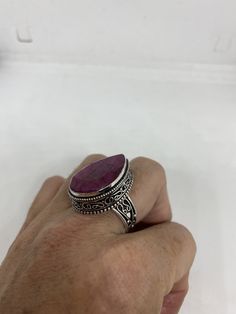 Unusual deep toned raw Ruby low content silver setting handmade size 8 Can be resized. My jeweler charges a $10- $20 fee All rings are shipped in a nice gift box. Check out our over a THOUSAND great reviews Engraving is $4 per letter and is not always perfect depending on the piece. It can take a few days if the jeweler is busy. This is payable to Paypal Judithsltd@gmail.com Untreated Open Ring As A Gift, Silver Ruby Ring With Large Stone For Anniversary, Unique Gift Ruby Ring With Stone Setting, Artisan Ring With Large Stone For Gift, Unique Ruby Ring With Stone Setting As Gift, Unique Silver Ruby Ring As Gift, Handmade Teardrop Crystal Ring Gift, Spiritual Rings With Large Stone As Gift, Artisan Stamped 925 Rings For Gifts