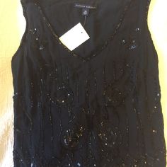 Holiday Sequin Top. Black With Silver Sequins. Sleeveless. Scalloped Bottom. Art Deco Style. Delicate, Vintage. In Excellent Condition. Comes With A Packet Of Extra Sequins. These Pics Do Not Do This Special Top Justice. Can Go With The Matching Skirt. Elegant V-neck Vest For Party, Elegant Tank Top For Party Season, Elegant Tank Vest For Party, Glamorous Embellished Black Tank Top, Glamorous Black Embellished Tank Top, Elegant Tank Vest For Night Out, Black Sequin Tank Top For Evening, Elegant Sequined Tank Top For Evening, Party Black Tank Vest