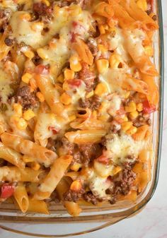 a casserole dish filled with cheese and ground beef