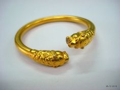 "Ethnic Traditional design gold vermeil gold gilded silver Bracelet or Bangle from Rajasthan India. This Bangle has been made in Rajasthan by Expert local silversmith, it is handmade and has very nice traditional look. Very Easy to wear by little twiest. weight - 24 grams Inner Diameter - 5.9 cm (2.3\") Inner circumference - 18.5 cm (7.28\") Outer diameter - 7.3 cm (2.87\") width - 0.8 cm material - Good silver with gold plate." Gold Byzantine Jewelry For Festivals, Gold Bangle For Formal Occasions, Byzantine Gold Jewelry For Festivals, Gold Spiritual Cuff Bracelet For Ceremonial Occasions, Spiritual Gold Cuff Bracelet For Ceremonial Wear, Gold Spiritual Bangle For Formal Occasions, Gold Byzantine Bangle Bracelets, Gold Byzantine Bangle Bracelet, Gold Byzantine Bracelets For Ceremonial Occasions