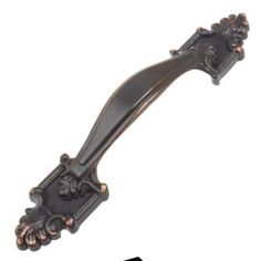 an ornate black handle on a white background