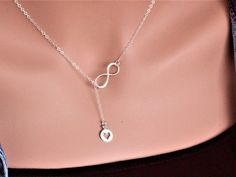 "Sterling Silver Infinity Heart Necklace The picture length is 17\" , it could be shorter or longer , depend on customer choice. Perfect express for infinity love. The Picture length is 17\". ★It consists of... -Sterling Silver 8x10.9mm Heart Cutout Charm, -Sterling Silver Infinity link, and -Sterling silver cable chain with spring claw and -One set of Care instruction package. Total length will be 15\",16\", 17\",18\" ,19\" or 20\" that will not be count 1\" dangle. MORE HEART NECKLACES https:/ Mother's Day Gift Lariat Necklace With Adjustable Chain, Adjustable Lariat Necklace For Mother's Day Gift, Adjustable Chain Lariat Necklace For Mother's Day, Lariat Jewelry For Anniversary And Mother's Day, Mother's Day Lariat Necklace For Anniversary, Mother's Day Lariat Jewelry Gift, Mother's Day Gift Lariat Jewelry, Mother's Day Silver Lariat Necklace, Adjustable Lariat Necklace For Anniversary