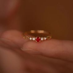 Dainty Ruby Gold Ring, July Birthstone Rings, Ruby Diamond Ring, Red Ruby Stacking Ring, Genuine Ruby Rings, Graduation Ring, Casual Rings We use the highest quality moissanite! Moissanite: ✦ Color: D Colorless ✦ Clarity: VVS1 OR All our diamonds are 100% natural. We use only conflict-free diamonds and gemstones. Diamond: ✦ Color: F-G ✦ Clarity: SI1-VS ✦PRODUCT DETAILS✦ → center stone: natural ruby → accent stone: diamonds Also available in other colored gemstones upon request. Please get in tou Fine Jewelry Red Ruby Ring, Fine Jewelry With Red Center Stone, Fine Jewelry Lab-created Ruby Promise Ring, Ruby Jewelry With Prong Setting For Promise, Red Gemstone Accented Round Rings, Ruby Ring With Diamond Accents, Promise Ruby Jewelry With Center Stone, Ruby Open Promise Ring, Round Ruby Ring With Gemstone Accents