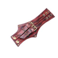 Stylish Steampunk leather bracelet Upgrade your accessory game with our Steampunk leather bracelet. Crafted with premium leather, this bracelet combines vintage charm with contemporary style. The rich brown tones and distressed finish give it a rugged and worn look, perfect for adding an edgy touch to your Steampunk ensemble. Versatile and eye-catching, our Steampunk leather bracelet is perfect for both casual and formal occasions. Whether you're attending a Steampunk event, cosplay gathering, o Brown Punk Leather Bracelet For Gift, Brown Leather Bracelet Fashion Accessory, Steampunk Leather Bracelet As A Gift, Steampunk Leather Bracelet Perfect As A Gift, Punk Style Leather Strap Bracelets, Punk Leather Strap Bracelets, Vintage Brown Adjustable Leather Bracelet, Brown Leather Strap Wristband, Vintage Brown Leather Fashion Bracelet