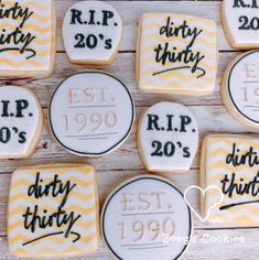 decorated cookies with the words dirty thirty are arranged on a table