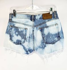 "Bleached and distressed pair of cut off Calvin Klein shorts.  Size 3 Waist 14.5\" flat Rise 9\" Inseam 2\"" Ripped Faded Jean Shorts, Faded Ripped Jean Shorts, Mid-rise Distressed Jean Shorts For Summer, Acid Wash Denim Cutoff Shorts, Distressed Light Wash Cutoff Shorts, Light Wash Distressed Cutoff Shorts, Summer Ripped Faded Jean Shorts, Summer Faded Ripped Jean Shorts, Acid Wash Distressed Jean Shorts