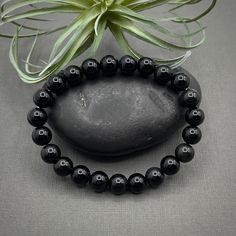 Black Onyx Gemstone Bracelet, 8mm Smooth Round Beaded Stretch Bracelet, Healing Bracelet, Beaded Bracelet, Yoga Jewelry, Yoga Gift, Black Beaded Bracelet, Men's Bracelet 8mm Round Beads Stretch Bracelet  Size: about 2-1/8 inch(5.5cm) inner diameter, beads: 0.31~0.35 inch(8~9mm). Price is for ONE Hand Selected Bracelet Onyx Crystal Bracelet With 8mm Round Beads, Round Onyx Stretch Bracelet With 8mm Beads, Black Beaded Bracelet, Black Beaded Bracelets, Yoga Gifts, Yoga Jewelry, Onyx Gemstone, Bracelet Beaded, Healing Bracelets