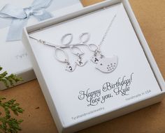 A great Mother's Day gift, this unique initial birds on branch lariat has two metal / color options: silver or gold. 1. a matte white gold/gold plated open leave branch charm 2. a matte white gold/gold plated mother bird charm 3. one or more matte white gold/gold plated baby birds, each stamped with an initial 4. a sterling silver/14K gold filled chain closed with a lobster clasp All findings are sterling silver/14K gold filled. Packaged in my shop's premium quality gift box. Please use the pull Birds On Branch, Mother Bird, Baby Birds, Baby Necklace, Family Monogram, Branch Necklace, Mother Jewelry, Family Necklace, Bird On Branch