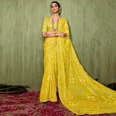 Lemon yellow color saree is made from chiffon is highlighted with beautiful foil printed with printed with embroidered border work as shown. Comes along unstitched embroidered chiffon blouse piece which you can customise as per your design/style. Occasion - You can wear this saree for festive and functions. Note:- The actual product may differ slightly in color and design from the one illustrated in the images when compared with computer or mobile screen. Measurements: Saree : Chiffon : 5.5 Mtrs Blouse : Chiffon : 0.8 Mtr Material: Chiffon Stitch Type: Unstitched Country of Origin: India Care Guide: Dry Clean Elegant Yellow Blouse Piece For Puja, Elegant Yellow Blouse For Puja, Yellow Blouse Piece For Eid, Gold Georgette Saree For Puja, Gold Georgette Saree For Navratri, Elegant Yellow Georgette Traditional Wear, Navratri Gold Georgette Saree, Elegant Unstitched Yellow Blouse Piece, Gold Georgette Blouse Piece For Puja