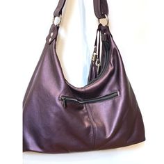 "Hobo Bag in Pearlised Antique Purple Leather  - Premium leather with chambray cotton lining (see photo lining 2) *  I have only 1 in stock for the Pearlised Antique Purple Leather Bag  *  1 inside zipper pockets. 2 leather edged slip pockets (both fit large cell phone) *  One Large compartment. *  High quality, double sided, strong adjustable shoulder strap. *  Strong ykk zipper closure.  *  Silver hardware.  *  Comes with double removable leather tassel, with designer hardware.      *  metal f Eclectic Outfits, Purple Stuff, Purple Bag, Purple Leather, Ykk Zipper, Leather Tassel, Silver Hardware, Hobo Bag, Chambray