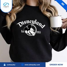 Minnie Disneyland Est 1955 Sweatshirt - Disneyland Castle - Disneyland Shirt - Family Vacation Shirt Alwaysky x Disney 2024. This stylish shirt will make your ensemble look better. It is expertly made and has a classic style that deftly combines comfort and design. Whether you're dressing up or down, this shirt is a perfect addition to your collection for any occasion. Comfort and durability are guaranteed by its superior fabric. You can step up your style game and make a statement that works wi Disneyland Family Shirts, Disneyland Shirt, Disneyland Castle, Disney Pics, Vacation Family, Disney Vacation Planning, Disneyland Shirts, Fashion Family, Family Vacation Shirts