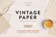 the vintage paper collection vol 1 is displayed on a table with papers and coffee mugs