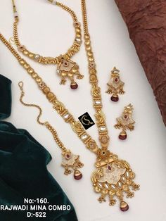 Description :- Exclusive Wedding Necklace Sets Antique Gold-Plated Indian Jewelry Set with Long Necklace and Earrings The biggest highlight of this manalis Myra necklace set lies in its detailing. The designers at Tarinika have put meticulous attention to details in order to perfect the detailing of the unique and intricate design. The bead-like design of the necklace's chain fuses ethnic style with contemporary flairs. 100% Satisfaction Guarantee: 1 Year Warranty, Long Lasting Plating, High-Qua Gold Cutdana Necklaces For Marriage, Temple Jewelry Sets With Latkans For Wedding, Chandbali Bridal Necklace For Diwali Marriage, Chandbali Bridal Necklace For Marriage During Diwali, Gold Festive Sets For Marriage, Gold Sets With Pallu For Marriage, Temple Jewelry Bridal Necklace With Latkans For Marriage, Elegant Chandbali Bridal Sets For Puja, Festive Sets With Intricate Design For Marriage