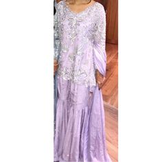 Comes With Extra Trousers, Gharara, Dupta And Top. Embroidery In Front And Back With Full Pearl On Duptta And Gharara. Perfect Wedding Guest Outfit. Floor-length Chikankari Embroidery Sharara, Traditional Drape Purple Palazzo Set For Wedding, Purple Traditional Drape Palazzo Set For Wedding, Elegant Purple Sharara With Chikankari Embroidery, Purple Palazzo Set With Resham Embroidery For Wedding, Purple Palazzo Set With Dupatta For Wedding, Purple Wedding Palazzo Set With Dupatta, Elegant Purple Silk Sharara, Embroidered Floor-length Organza Sharara