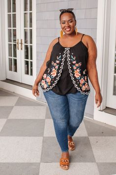 This is a beautiful addition to your wardrobe. Slimming detail on this tulip style tank. Adjustable straps, embroidered decor, and 100% rayon. #floraltop #backtotheoffice #officewear #officestyle #zoomoutfit #officeworkwear #blouse #floralblouse Jumpsuit Layering, White Skinnies, Garden Picnic, Embroidered Tank, Tan Sandals, Gloomy Day, Blue Garden, Cute Spring, Spring Inspiration