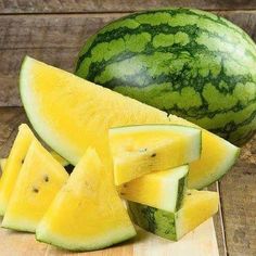 sliced watermelon on a wooden cutting board